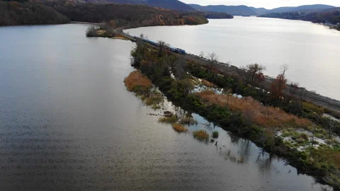 Train is going through the swamps. Constitution Marsh in Garrison, New York. USA Stock Footage 141497275