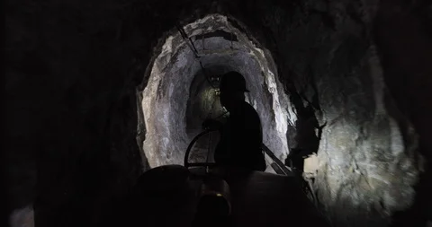 Train Hard rock mining tunnel deep underground mountain 4K Stock Footage 111991209