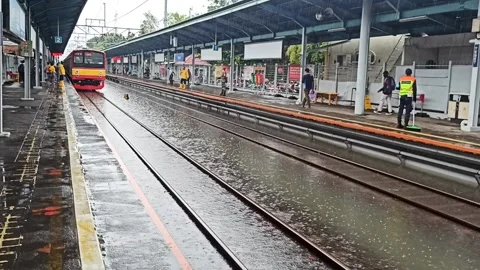 THE TRAIN HAVE TO MOVE SLOWLY BECAUSE OF THE RAIN Stock Footage 149124298