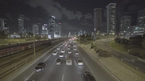Train + Highway rush hour with skyline  Stock Footage 58181480