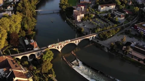 Train. Historical bridge. Oldtown. River. Waterfall. Stock Footage 138435856