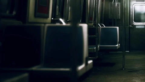 Train interior with empty seats and quiet atmosphere in subway car Stock Footage 340025422
