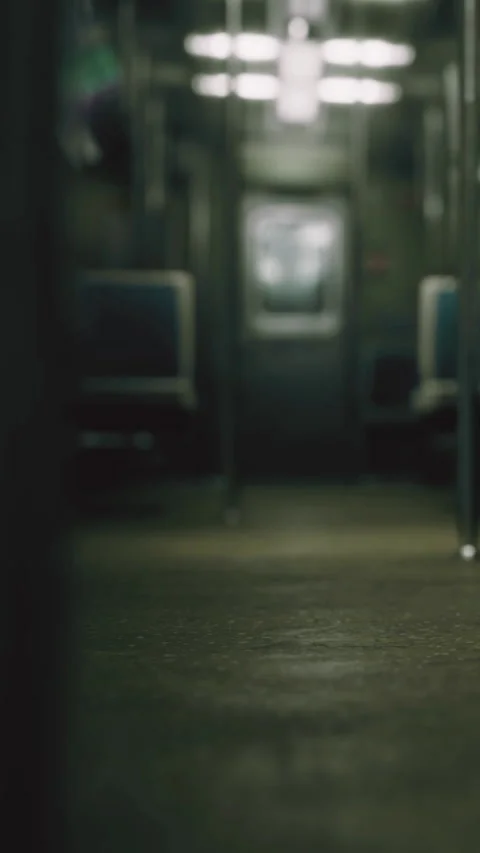 Train interior shows empty seats in a subway carriage during a quiet moment Stock Footage 334259708