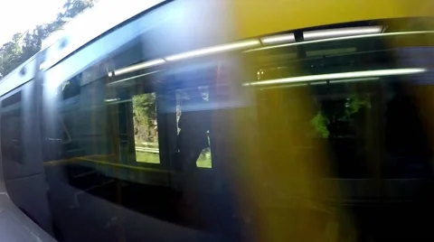 Train interior as two pass each other on Sydney rail line. Video stock 63749962