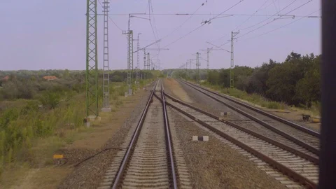 Train Interior View of Rail Road Tracks Through Back Window Stock Footage 101642860