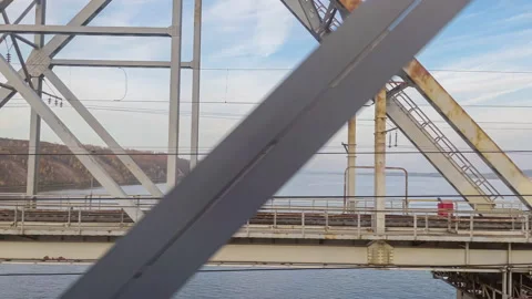 Train journey passing an old bridge Stock Footage 309381102