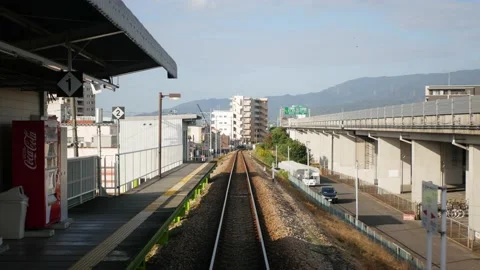 Train journey point of view from on the rear back view of train commuter ca.. Video stock 229485400