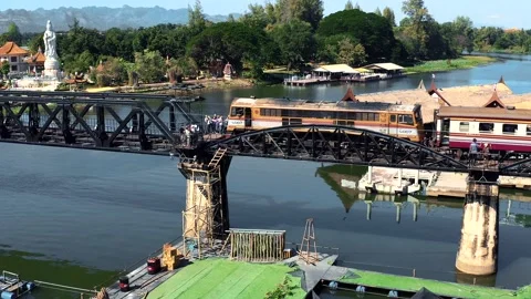 TRAIN ON THE KWAI RIVER BRIDGE 01 Stock Footage 169163877