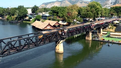 TRAIN ON THE KWAI RIVER BRIDGE 03 Stock Footage 169163909