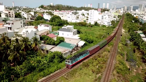 The train leaves the city Stock Footage 240976392