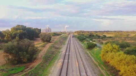 A train leaves the town Stock Footage 168550944
