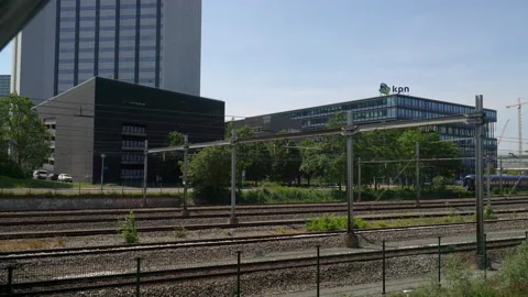 Train leaving the Amsterdam Sloterdijk train station Stock Footage 131336662