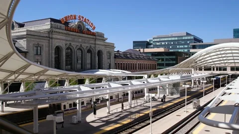 Train Leaving Denver's Union Station Mid Day Stock Footage 168760592