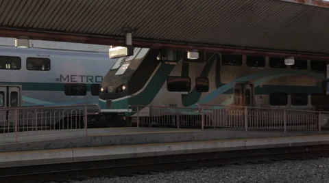 Train leaving LA Union Station platform during sunset Stock Footage 61065164