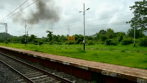 Train Leaving old Rural Remote empty village station Platform Maharashtra India Stock Footage 155347577
