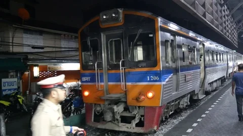 Train leaving the platform in Bangkok Stock Footage 107591843
