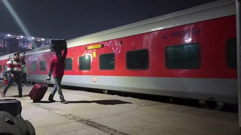Train leaving the platform on Nizamuddin Railway Station, Delhi, India Stock Footage 222264755