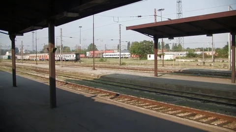 Train leaving a small station Stock Footage 93960289