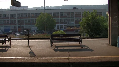 Train leaving a small station Stock Footage 93961061