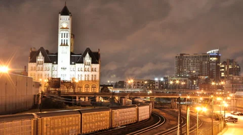 Train leaving Station as Clouds Blow past old Nashville Building Timelapse Video stock 60697991
