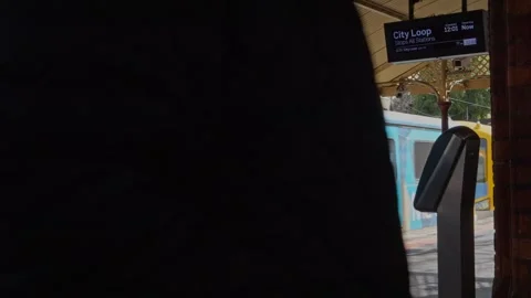 Train leaving station during midday - Melbourne Metro Train Station Stock Footage 304093170