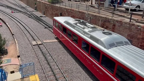 Train leaving the station on the Manitou and Pike’s Peak Cog Railway Stock Footage 312272782