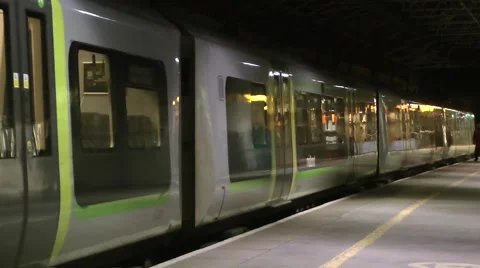 Train leaving station at night Stock Footage 46658350
