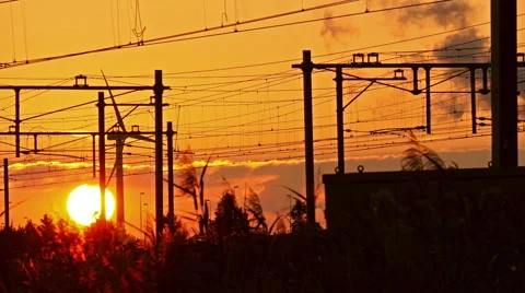 Train is leaving the station at sunset, 4k footage. Stock Footage 66491335