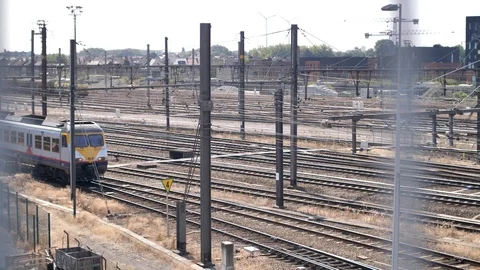 Train leaving train station Stock Footage 92893505