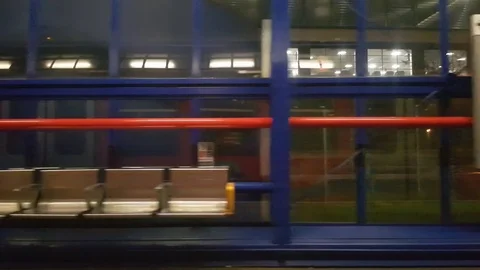 Train leaving the train station at night in london, britain. Stock Footage 85037629