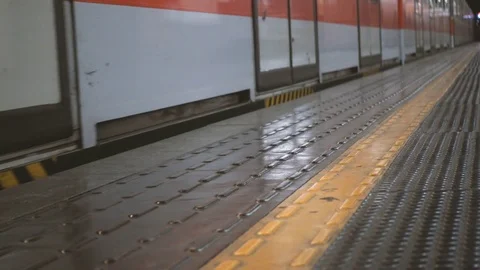 Train leaving underground station and yellow line Stock Footage 71309019