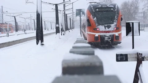Train leaving winter Stock Footage 104300300