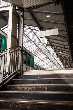 Train on line 6 of the Parisian elevated metro arriving at a station platfo.. Stock Photos