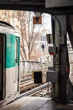 Train on line 6 of the Parisian elevated metro departing from a station in .. Stock Photos