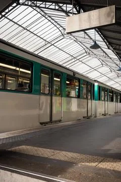 A train on line 6 of the Parisian elevated metro stops on a station platfor.. Stock Photos