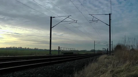 Train line at sunset moody sky Stock Footage 46457270
