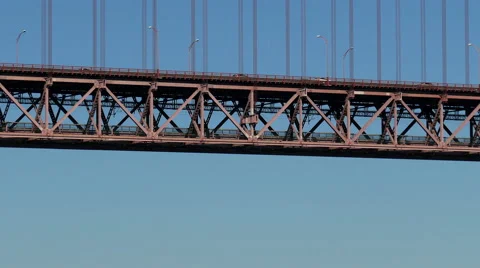 Train on the Lower Level 25 de Abril Bridge in Lisbon Stock Footage 41225336