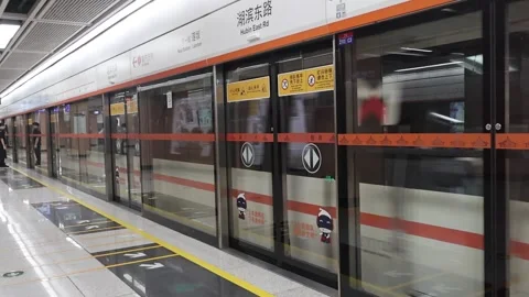 Train metro running for sending received chinese people passengers at China Stock Footage 330591397
