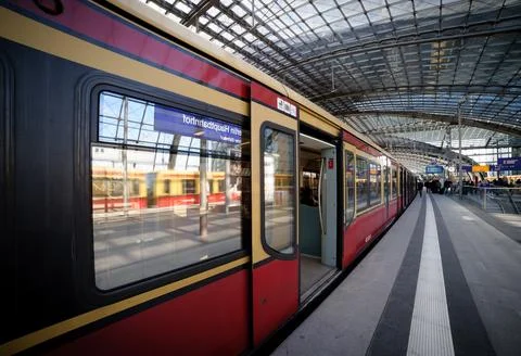 Train at a Modern Railway Station Platform Stock Photos