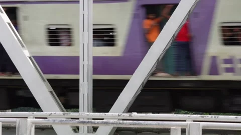 A train in motion, crosses the bridge Stock Footage 314508490