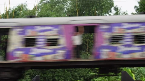 A train in motion on a railway track Stock Footage 319929932