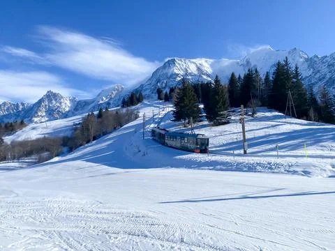 Train in the mountains on the slopes next.. Stock Photos
