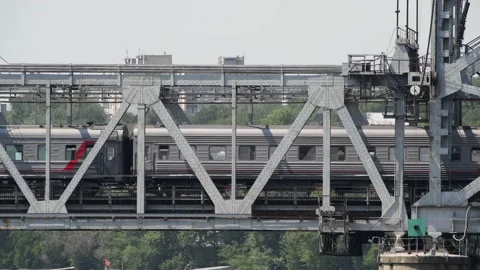 Train moves on bascule bridge Stock Footage 221706083