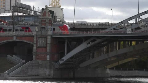 Train moves on railway bridge Stock Footage 261729765