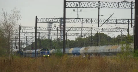 Train Moves On The Railway Long Cargo Train Stands On The Farther Railway Track Stock Footage 54839822