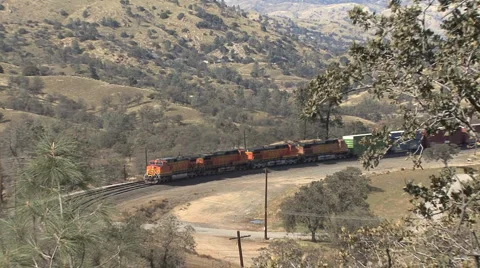 Train moves into the Tehachapi Loop Stock Footage 4819839