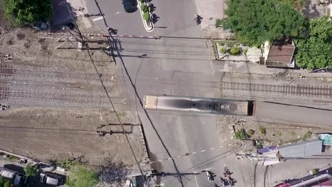 The train moves through the road top view Stock Footage 241066463