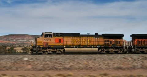 Train moving across desert Stock-Footage 87635483