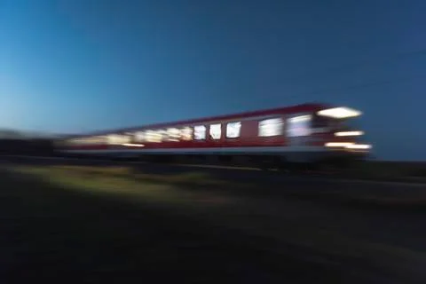 Train moving at night. Blur motion train. Traveling at night Stock Photos