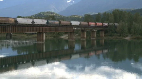 Train moving over Lake Stock Footage 342080